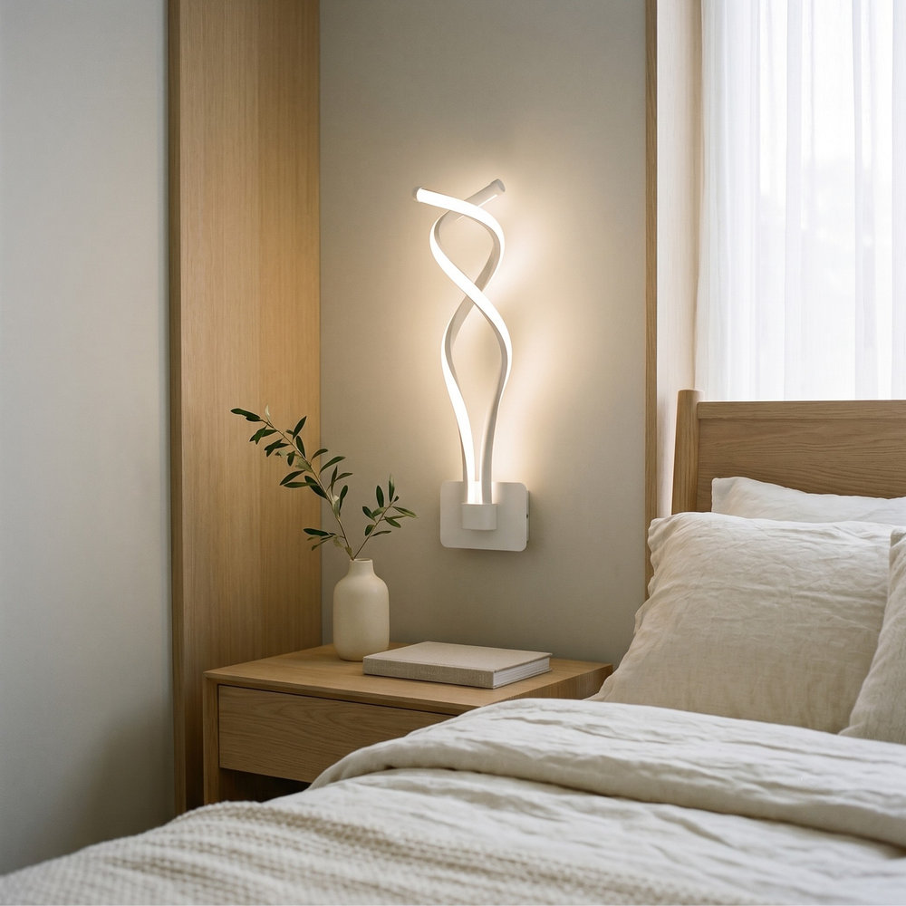 White spiral wall sconce mounted beside bed in bright modern bedroom