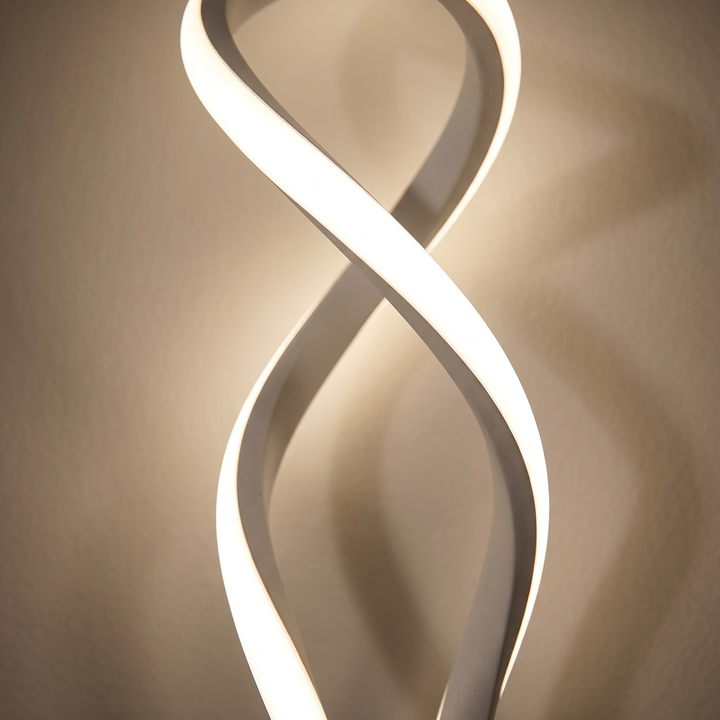 White spiral LED wall lamp in clean modern hallway with cool white light