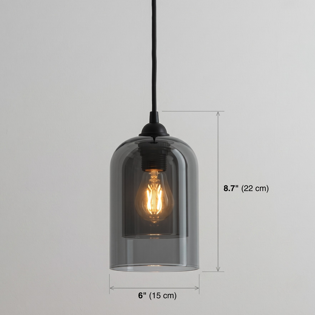 Two smoked glass pendant lights hanging on both sides of bed above nightstands